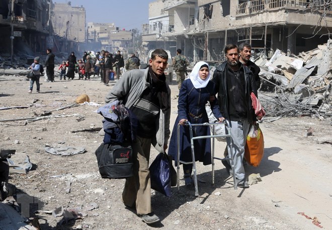 Quét tin thế giới ngày 18/3: Quân đội Syria ra tối hậu thư cho phiến quân tại Ghouta - Hình 5