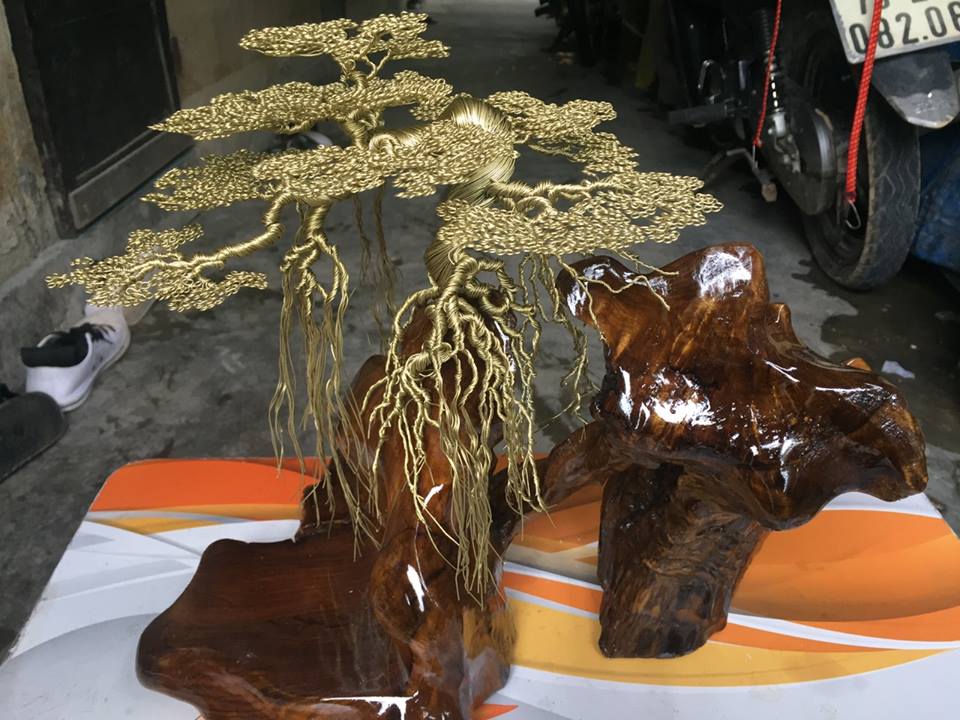 Nam sinh "hốt bạc" nhờ bán cây bonsai bằng đồng trong dịp Tết - Hình 7