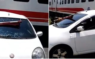 VIDEO: Ô tô bị tàu hỏa kéo lê do nữ tài xế... ngủ gật VIDEO: Ô tô bị tàu hỏa kéo lê do nữ tài xế... ngủ gật