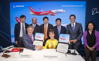 Vietjet ký kết mua 100 tàu bay với Boeing và 50 tàu bay với Airbus tại Airshow Farnborough 2018 Vietjet ký kết mua 100 tàu bay với Boeing và 50 tàu bay với Airbus tại Airshow Farnborough 2018