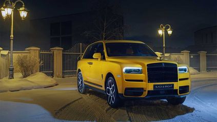 rolls royce cullinan black and bright collection yellow three quarters